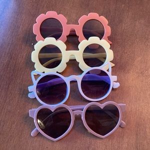 Set of 4 toddler sunglass. Great for sun, fun, dress up or as little gifts.